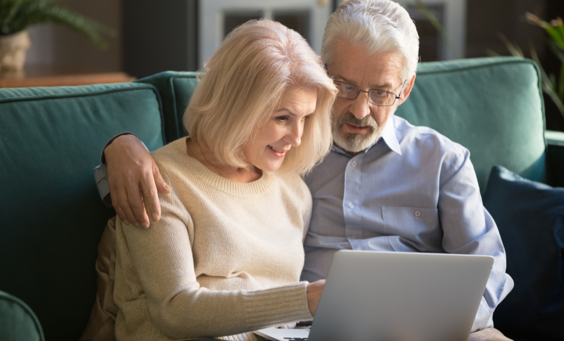 older couple looking at insurance options online