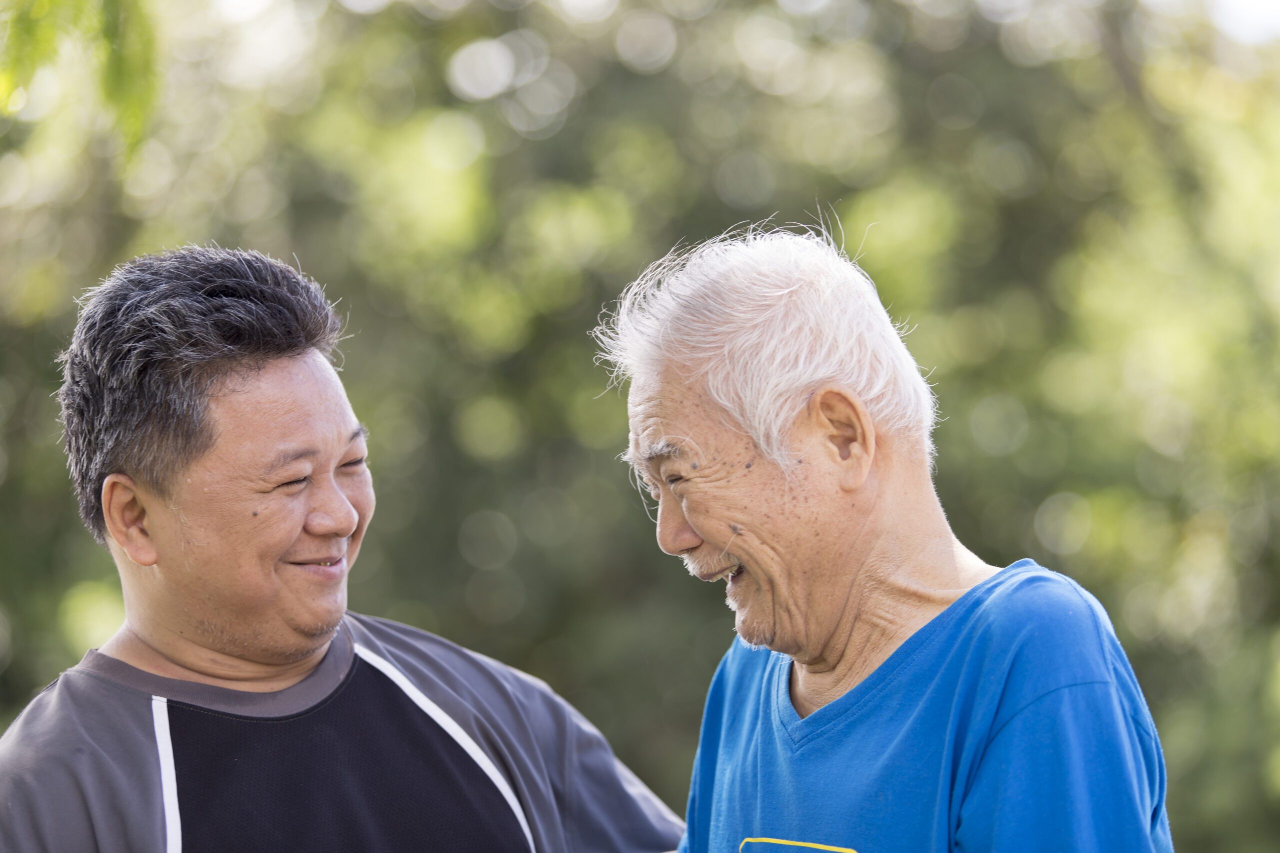 A son and father enjoying time together outside