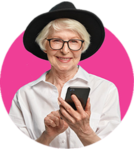 Smiling retiree sending a message with their smartphone