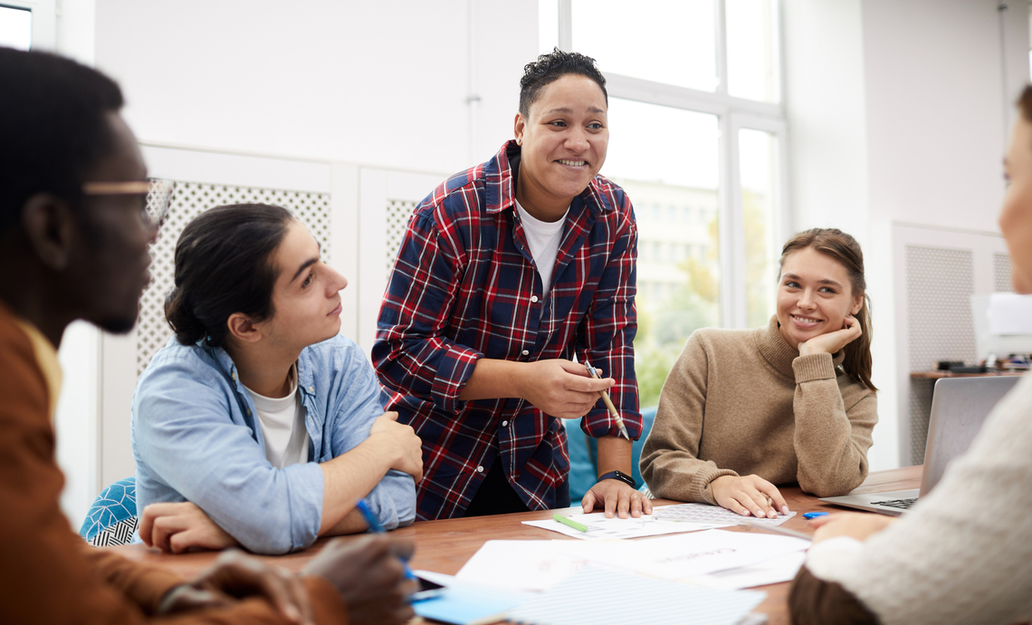 Group of youth at an environmental planning meeting.