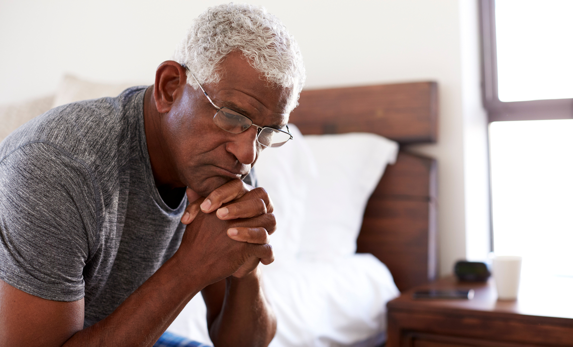 older man looking sad