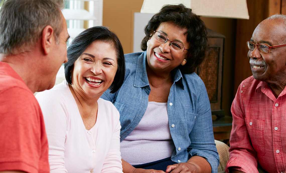 A group of retired friends laughing